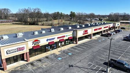 A look at Covington Corner WMT Anchored Shopping Center commercial space in Covington