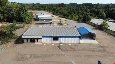 A look at 7,433 SF on 3.16 Acres w/ 173' frontage on Business HWY 82! - Leased Industrial space for Rent in El Dorado