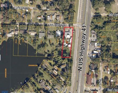 A look at Retail/Office Frontage on Hwy 41 - Lakefront with 4 Buildings on 1/2 acre commercial space in Lutz