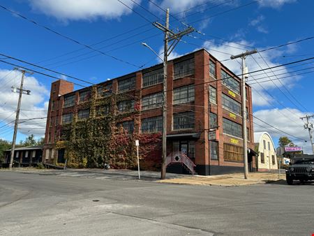 A look at Former Popcorn Supply Company Building commercial space in Syracuse