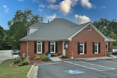A look at NEW PRICE! +/-6,524 SF Brick Building FOR SALE commercial space in Fayetteville