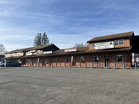 A look at Neighborhood Center with 11 Retail Units commercial space in Blakeslee