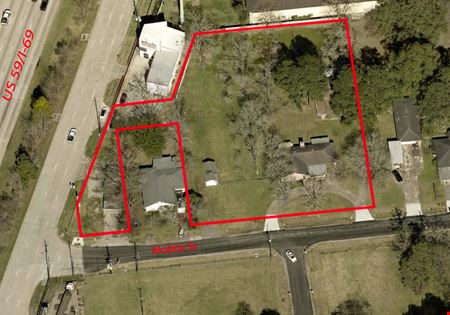 A look at 1.5 AC of land with Direct access to US 59/I-69 for Sale! commercial space in Humble