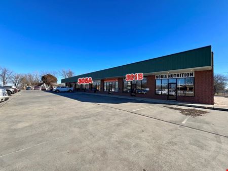 A look at Noble Shopping Center Retail space for Rent in Noble