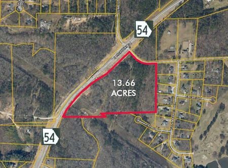 A look at +/-13.66 Acres For Sale with E Hwy 54 Frontage Commercial space for Sale in Jonesboro