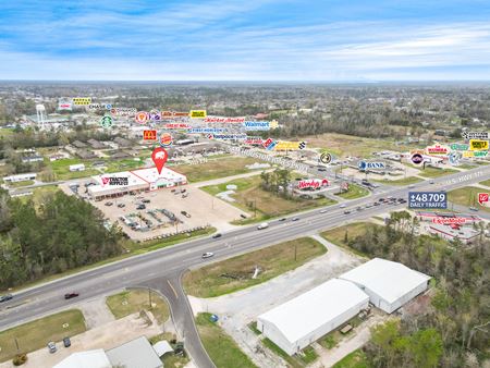 A look at Highly Visible Retail Space in Moss Bluff Shopping Center Retail space for Rent in Moss Bluff