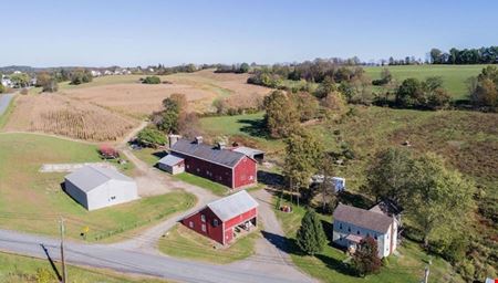 A look at Great Land with over a half mile of road frontage and story book setting red barn commercial space in Westtown