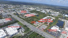 Free Standing Building on Clark Rd on 1.003 +-/ Acres of Land - Across from Mercedes Dealership