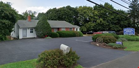 A look at ±3,120 SF Professional Office with Residential Apartment commercial space in Clinton