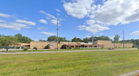 A look at 1704 E Highland Rd commercial space in Highland Township