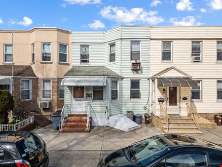 A look at Two-family home in the heart of Middle Village commercial space in Middle Village