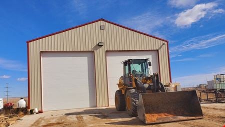 A look at 3,200 Sq Ft. Shop On +/-9.85 Acres. Fenced & Stabilized commercial space in Williston