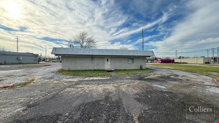 A look at Seven (7) parcels totaling 14.67 acres (AC) with a 1,282 SF home and 1,740 SF former bank branch with drive-thru are now available for sale commercial space in Elyria