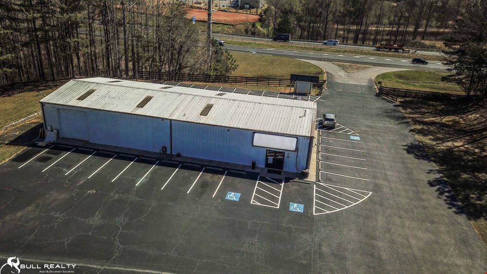 Single-Tenant Retail Building Visible From GA-400  | ±4,000 | Sale Leaseback | NNN Lease